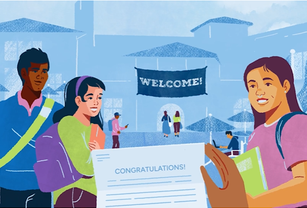 A group of college students viewing an acceptance letter.